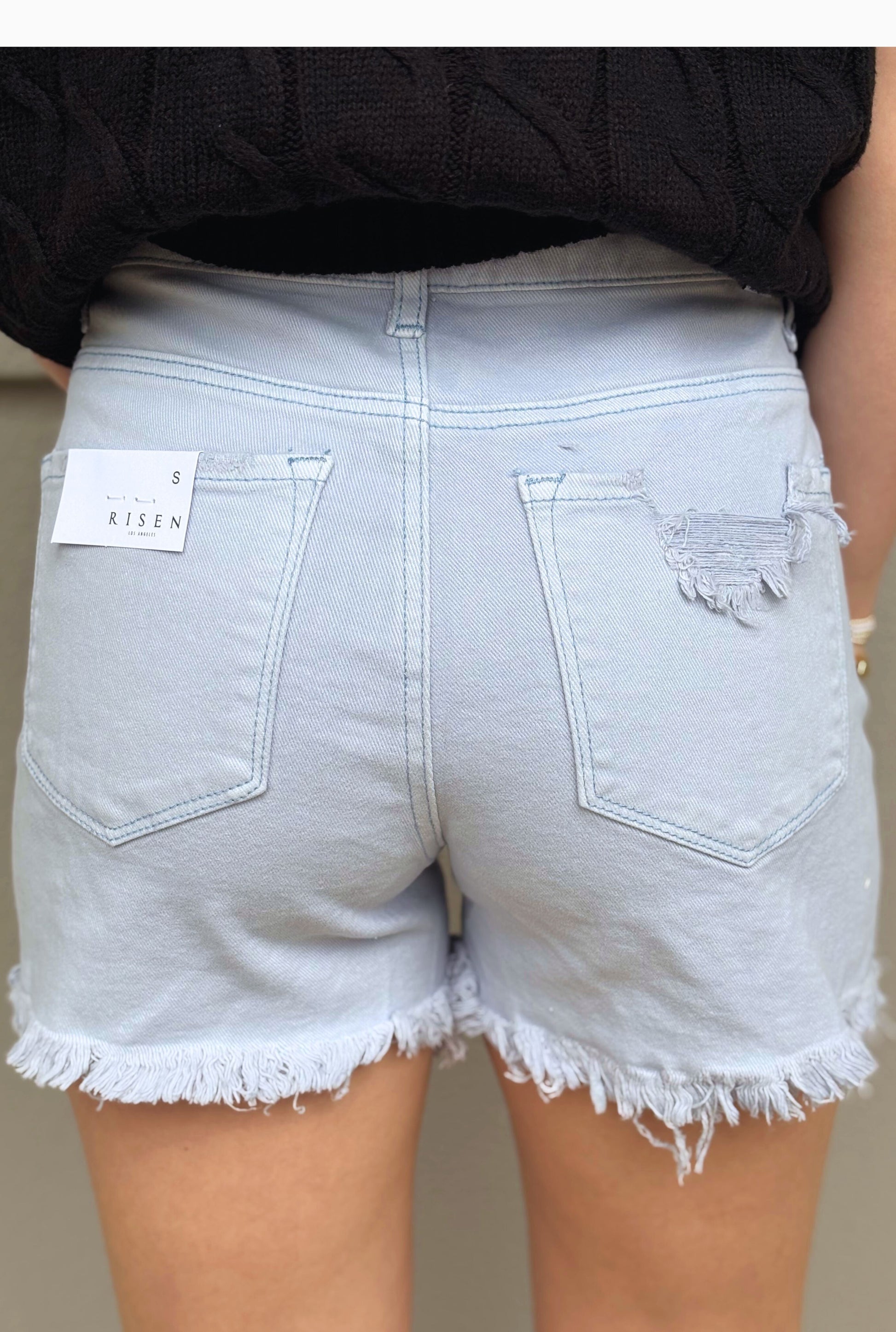 ICE BLUE HIGH RISE DISTRESSED DETAIL SHORTS