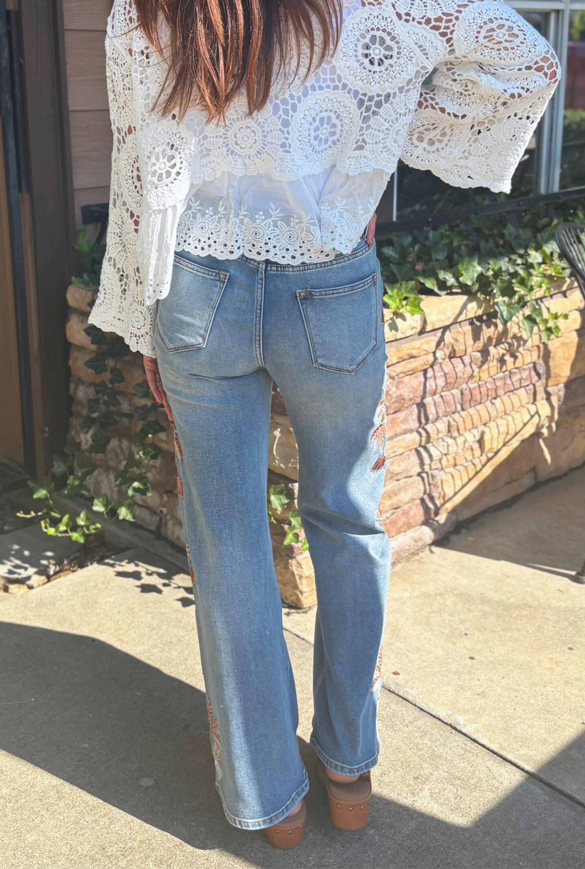 HIGH RISE FLARE EMBROIDERED JEANS