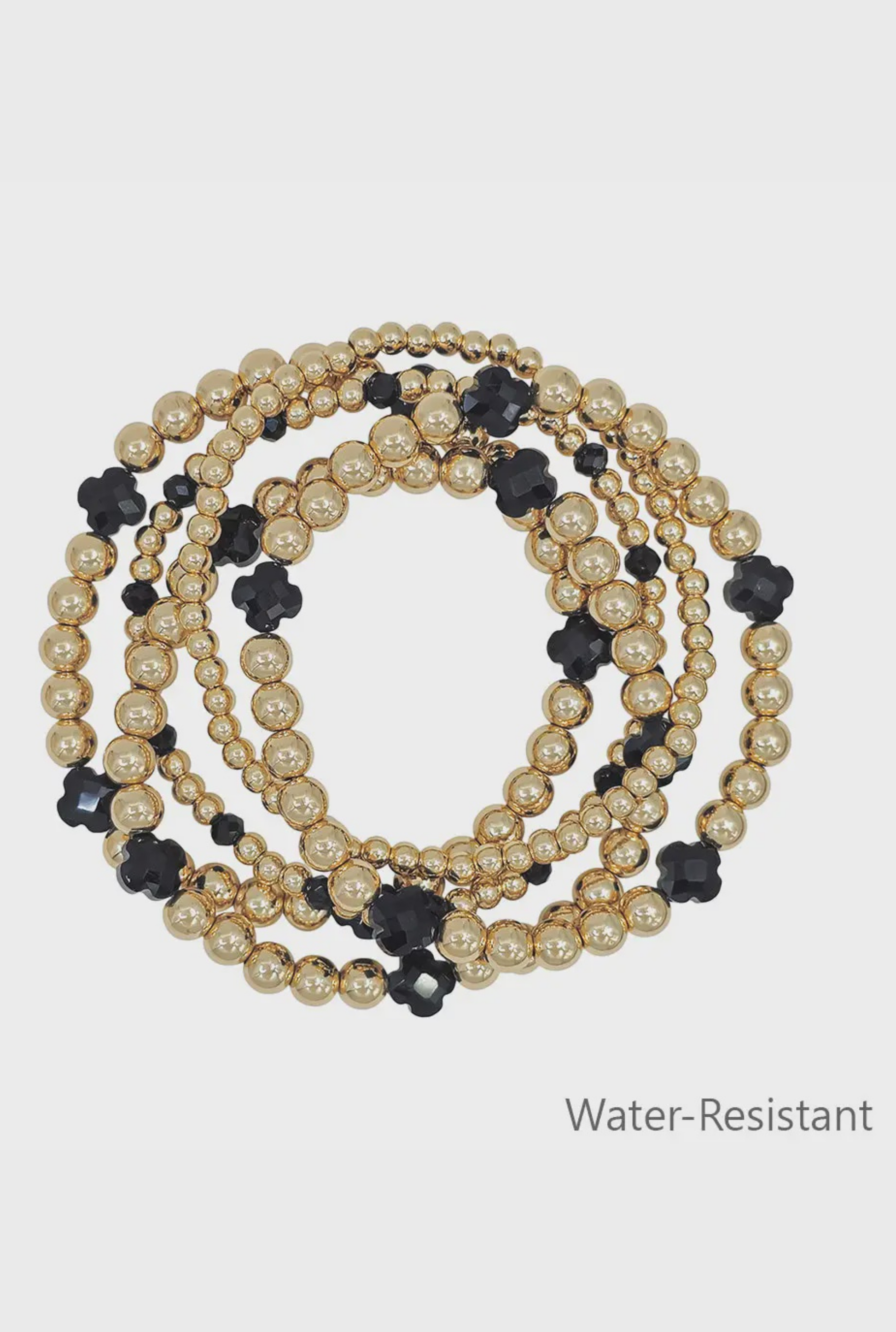 Water Resistant Set of 5 Gold Textured Beaded and Black Clover Stretch Bracelets