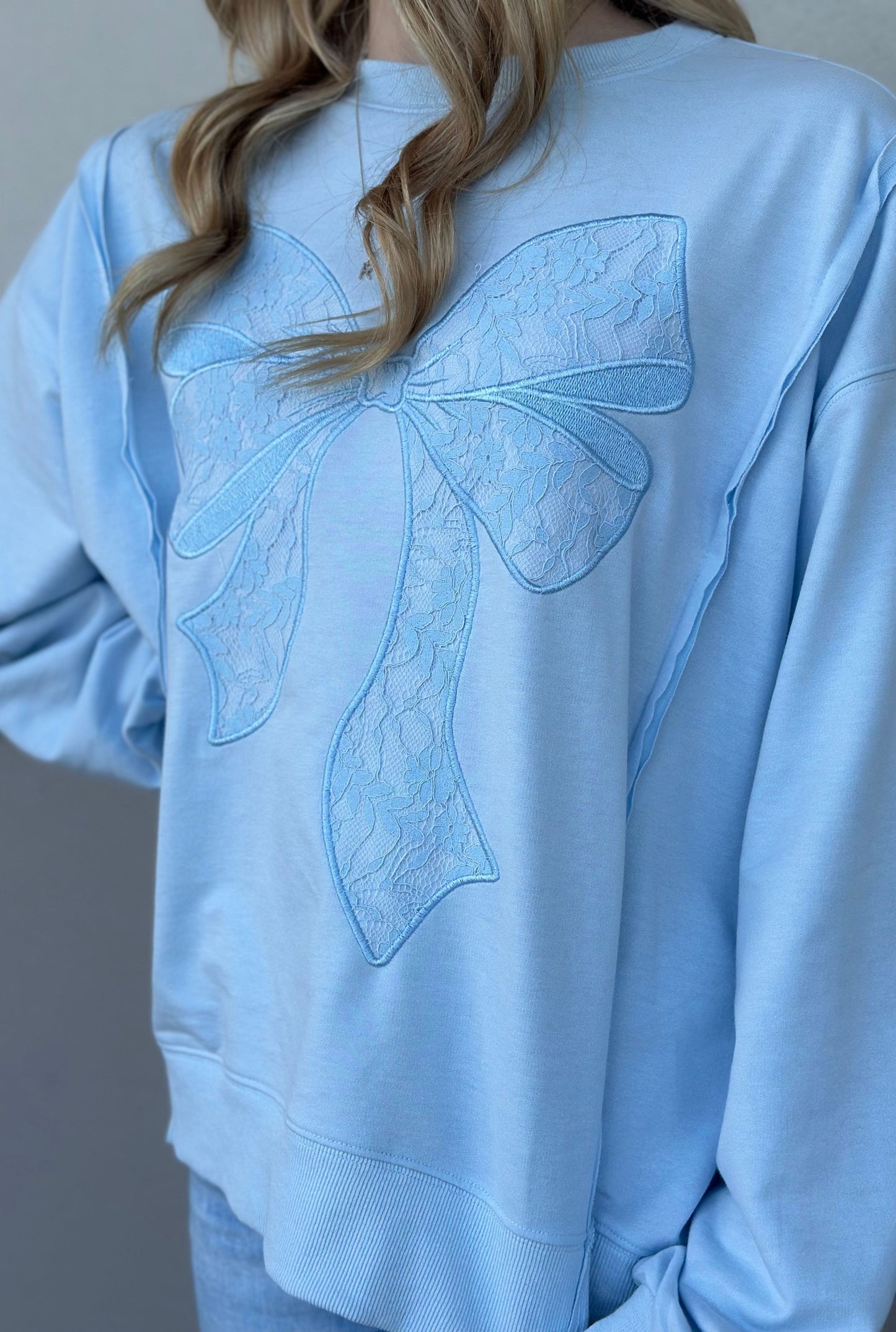 BLUE PATCHWORK BOW SWEATER