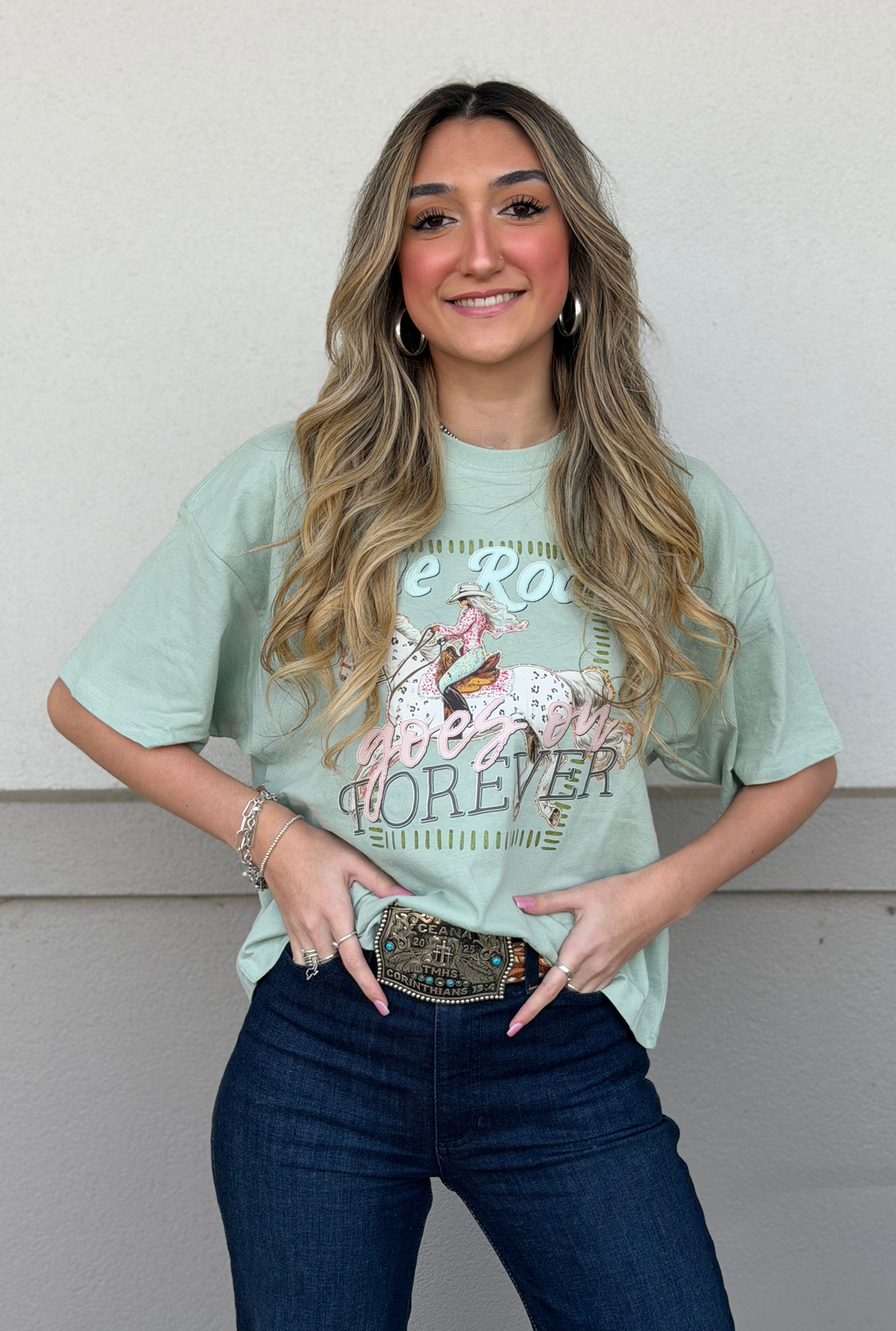 THE RODEO GOES ON FOREVER GRAPHIC RELAXED CROP TOP
