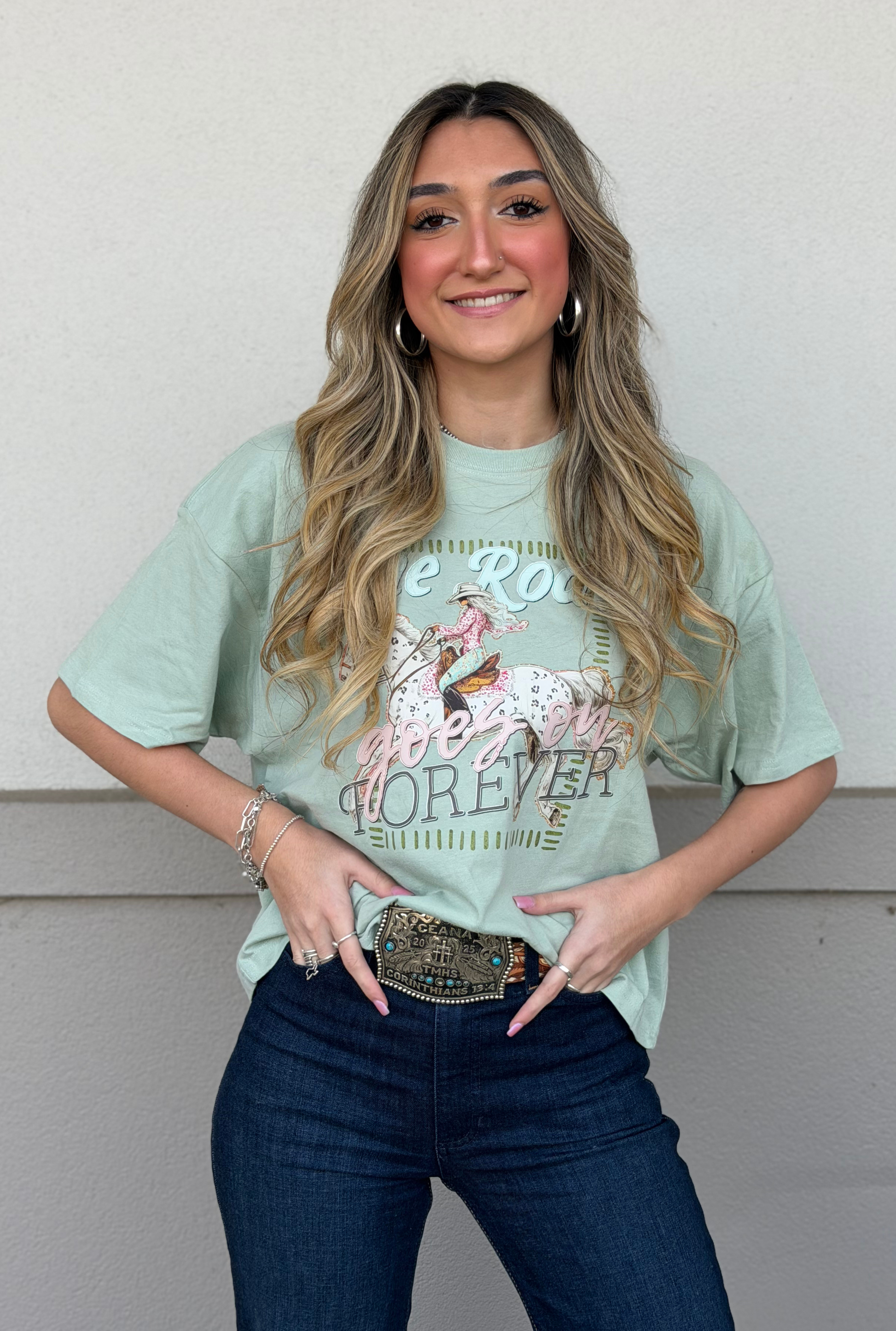 THE RODEO GOES ON FOREVER GRAPHIC RELAXED CROP TOP