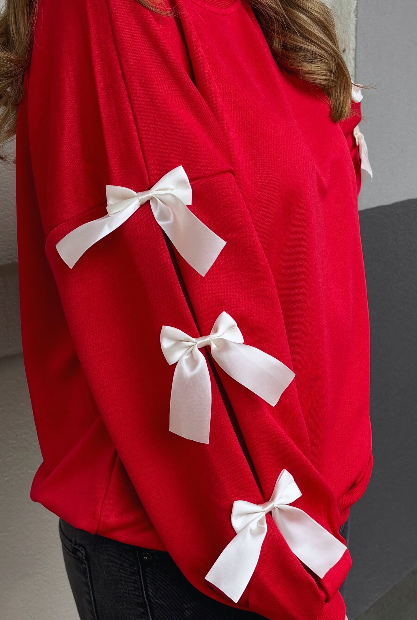 RED BOW SLEEVE SWEATER