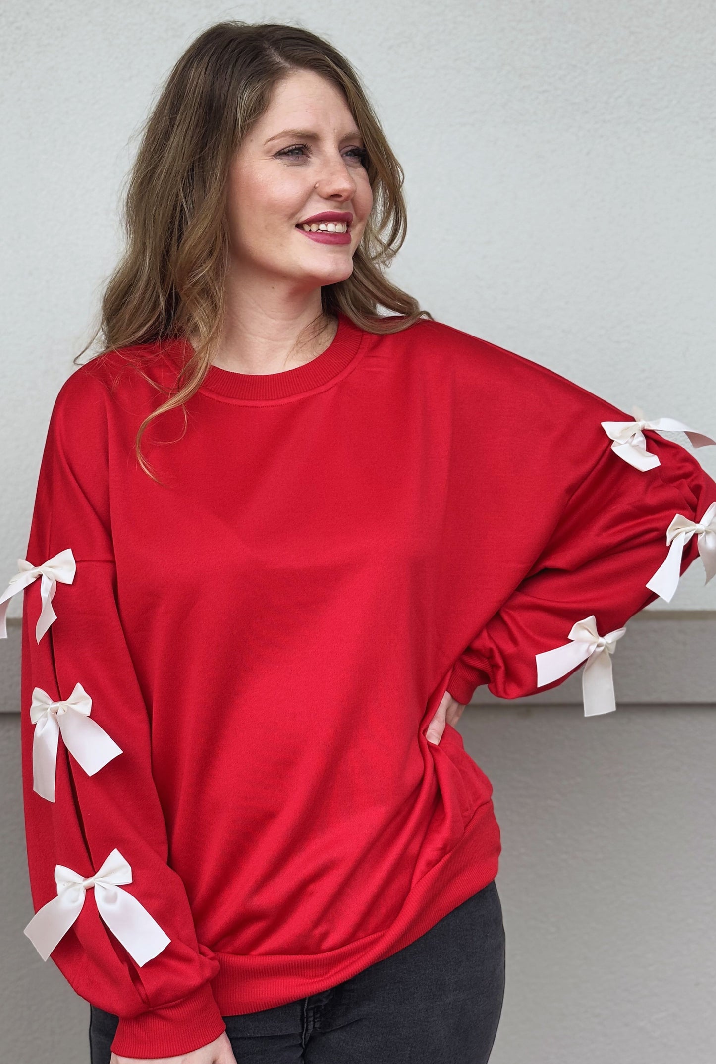 RED BOW SLEEVE SWEATER