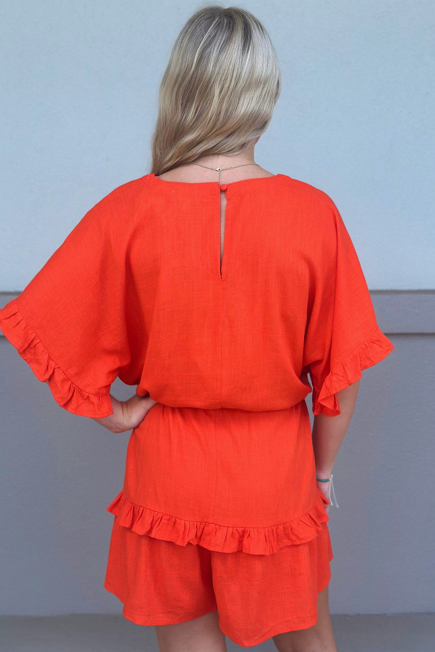 STRIKING ROMPER NEON ORANGE